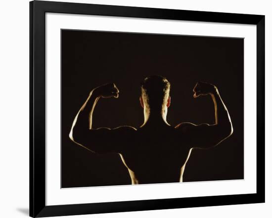 Rear View of a Young Man Flexing His Muscles-null-Framed Photographic Print