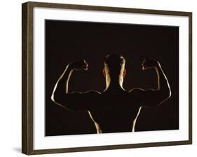 Rear View of a Young Man Flexing His Muscles-null-Framed Photographic Print