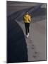 Rear View of a Young Woman Running on a Sand Dune-null-Mounted Photographic Print