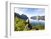 Rear view of photographer admiring the Mefjord blue water standing on rocks-Roberto Moiola-Framed Photographic Print