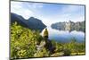 Rear view of photographer admiring the Mefjord blue water standing on rocks-Roberto Moiola-Mounted Photographic Print