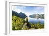 Rear view of photographer admiring the Mefjord blue water standing on rocks-Roberto Moiola-Framed Photographic Print