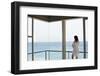 Rear View of Young Woman Looking at Ocean View from Balcony at Resort-Nosnibor137-Framed Photographic Print