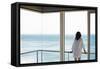 Rear View of Young Woman Looking at Sea View from Balcony at Resort-Nosnibor137-Framed Stretched Canvas