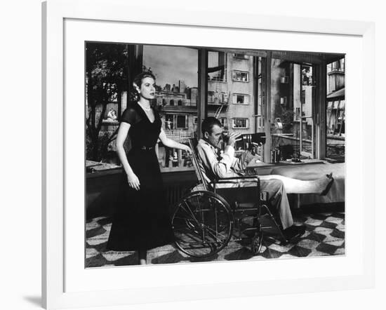 REAR WINDOW, 1954 directed by ALFRED HITCHCOCK Grace Kelly and James Stewart (b/w photo)-null-Framed Photo