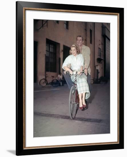 REAR WINDOW, 1954 directed by ALFRED HITCHCOCK On the set, Grace Kelly and James Stewart (photo)-null-Framed Photo