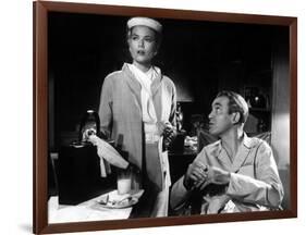 REAR WINDOW, 1954 directed byALFRED HITCHCOCK Grace Kelly and James Stewart (b/w photo)-null-Framed Photo