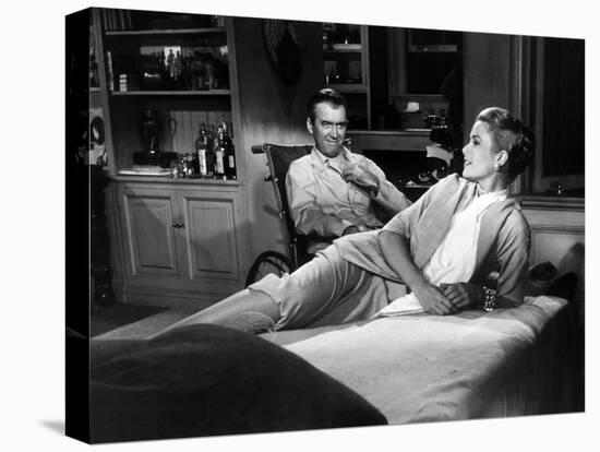 REAR WINDOW, 1954 directed byALFRED HITCHCOCK James Stewart and Grace Kelly (b/w photo)-null-Stretched Canvas