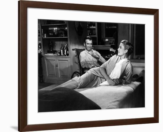 REAR WINDOW, 1954 directed byALFRED HITCHCOCK James Stewart and Grace Kelly (b/w photo)-null-Framed Photo