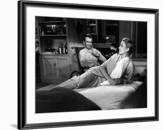 REAR WINDOW, 1954 directed byALFRED HITCHCOCK James Stewart and Grace Kelly (b/w photo)-null-Framed Photo