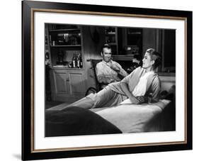 REAR WINDOW, 1954 directed byALFRED HITCHCOCK James Stewart and Grace Kelly (b/w photo)-null-Framed Photo