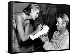 REAR WINDOW, 1954 directed byALFRED HITCHCOCK On the set, Grace Kelly and James Stewart (b/w photo)-null-Framed Stretched Canvas