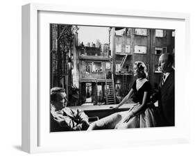 REAR WINDOW, 1954 directed byALFRED HITCHCOCK On the set, Grace Kelly between James Stewart and Alf-null-Framed Photo
