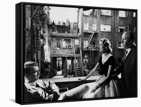 REAR WINDOW, 1954 directed byALFRED HITCHCOCK On the set, Grace Kelly between James Stewart and Alf-null-Framed Stretched Canvas