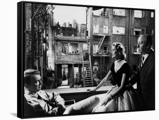 REAR WINDOW, 1954 directed byALFRED HITCHCOCK On the set, Grace Kelly between James Stewart and Alf-null-Framed Stretched Canvas