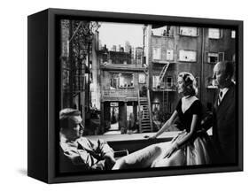 REAR WINDOW, 1954 directed byALFRED HITCHCOCK On the set, Grace Kelly between James Stewart and Alf-null-Framed Stretched Canvas