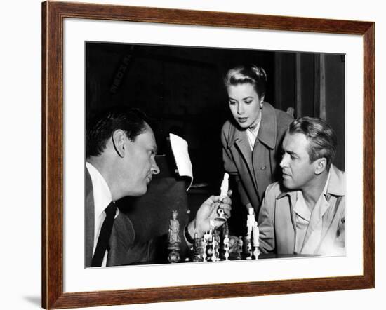 REAR WINDOW, 1954 directed byALFRED HITCHCOCK On the set, Wendell Corey, Grace Kelly and James Stew-null-Framed Photo