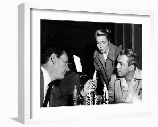 REAR WINDOW, 1954 directed byALFRED HITCHCOCK On the set, Wendell Corey, Grace Kelly and James Stew-null-Framed Photo