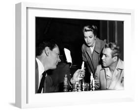 REAR WINDOW, 1954 directed byALFRED HITCHCOCK On the set, Wendell Corey, Grace Kelly and James Stew-null-Framed Photo