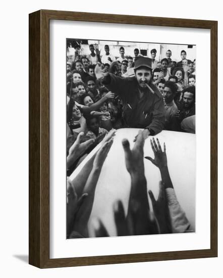 Rebel Leader Fidel Castro Being Cheered by a Village Crowd on His Victorious March to Havana-Grey Villet-Framed Photographic Print