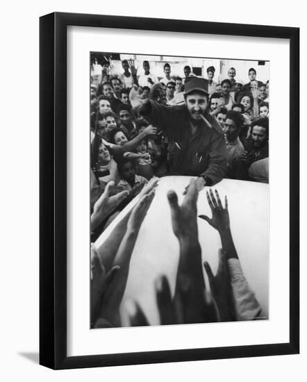 Rebel Leader Fidel Castro Being Cheered by a Village Crowd on His Victorious March to Havana-Grey Villet-Framed Photographic Print