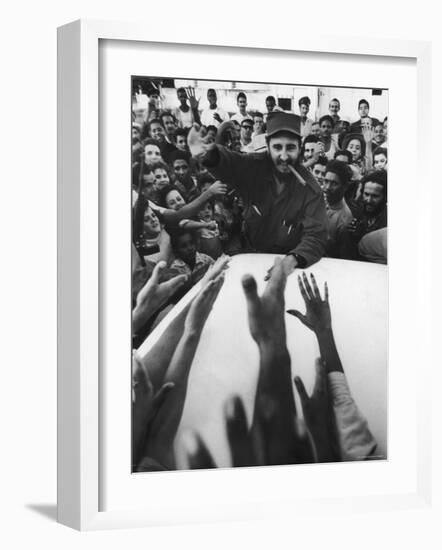 Rebel Leader Fidel Castro Being Cheered by a Village Crowd on His Victorious March to Havana-Grey Villet-Framed Photographic Print