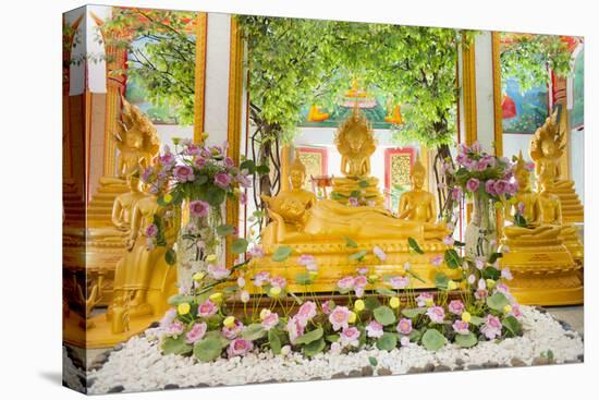 Reclining Buddha and Other Statues-Andrew Stewart-Stretched Canvas