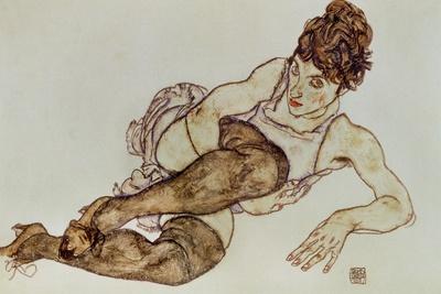 https://imgc.allpostersimages.com/img/posters/reclining-woman-with-black-stockings-1917_u-L-Q1IGFN90.jpg?artPerspective=n