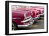 Red and pink vintage American car taxis on street in Havana, Cuba, West Indies, Central America-Ed Hasler-Framed Photographic Print