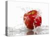 Red Apple with Splashing Water-Michael Löffler-Stretched Canvas
