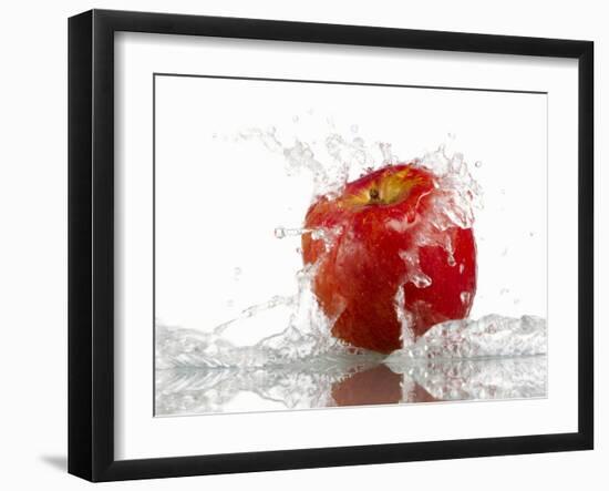 Red Apple with Splashing Water-Michael Löffler-Framed Photographic Print