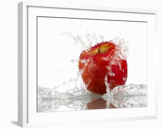 Red Apple with Splashing Water-Michael Löffler-Framed Photographic Print