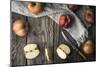 Red Apples and Apple Halves on a Wooden Table Horizontal-Denis Karpenkov-Mounted Photographic Print
