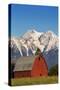 Red Barn Sits Below Mcdonald Peak in the Mission Valley, Montana, Usa-Chuck Haney-Stretched Canvas