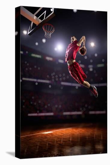 Red Basketball Player in Action in Gym-Eugene Onischenko-Stretched Canvas