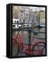 Red Bicycle by the Herengracht Canal, Amsterdam, Netherlands, Europe-Amanda Hall-Framed Stretched Canvas