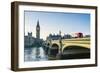 Red bus crossing Westminster Bridge towards Big Ben and the Houses of Parliament, London, England,-Fraser Hall-Framed Photographic Print