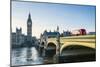 Red bus crossing Westminster Bridge towards Big Ben and the Houses of Parliament, London, England,-Fraser Hall-Mounted Photographic Print