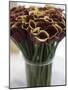 Red Calla Lilies in a Vase-Anthony Lanneretonne-Mounted Photographic Print