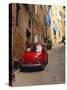 Red Car Parked in Narrow Street, Siena, Tuscany, Italy-Ruth Tomlinson-Stretched Canvas