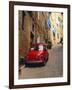 Red Car Parked in Narrow Street, Siena, Tuscany, Italy-Ruth Tomlinson-Framed Premium Photographic Print