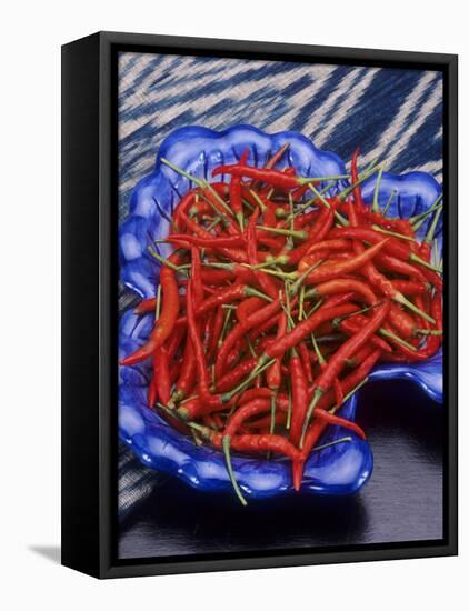 Red Chili Peppers in a Blue Bowl-Alberto Cassio-Framed Stretched Canvas