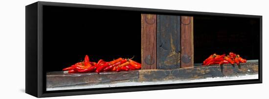 Red Chilies Drying on Window Sill, Paro, Bhutan-null-Framed Stretched Canvas