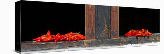Red Chilies Drying on Window Sill, Paro, Bhutan-null-Stretched Canvas