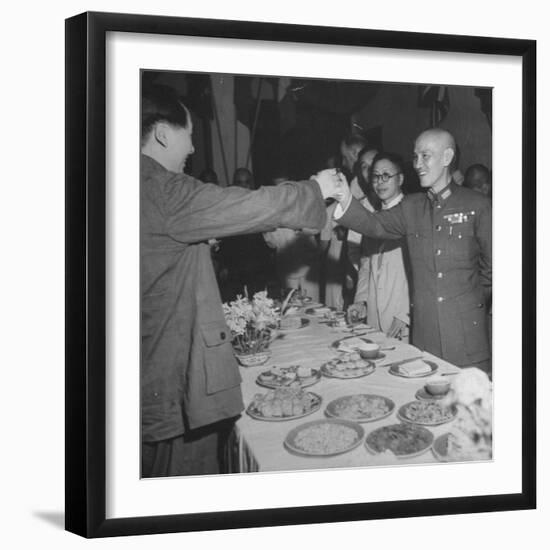 Red Chinese Leader Mao Tse Tung and Chiang Kai Shek Toasting One Another-null-Framed Photographic Print