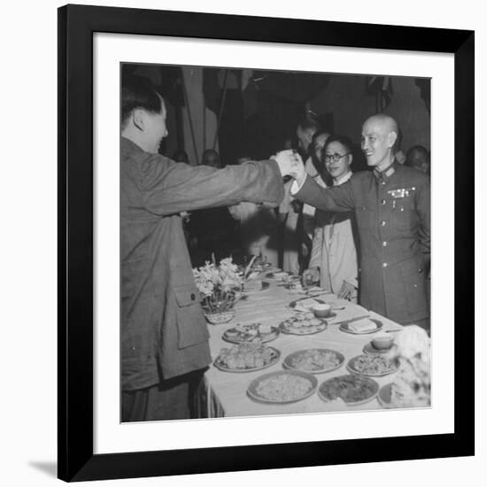 Red Chinese Leader Mao Tse Tung and Chiang Kai Shek Toasting One Another-null-Framed Photographic Print