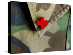 Red Cross on the Collar of a Camouflage Jacket-Winfred Evers-Stretched Canvas