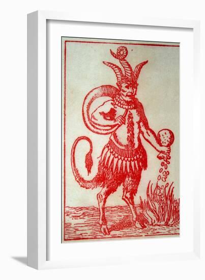 Red Devil with 3 Horns Tail and Goats Legs Pours Money into the Fire-null-Framed Art Print