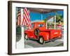 Red Dodge Pickup truck parked in front of vintage gas station in Santa Paula, California-null-Framed Photographic Print