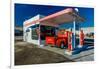 Red Dodge Pickup truck parked in front of vintage gas station in Santa Paula, California-null-Framed Photographic Print